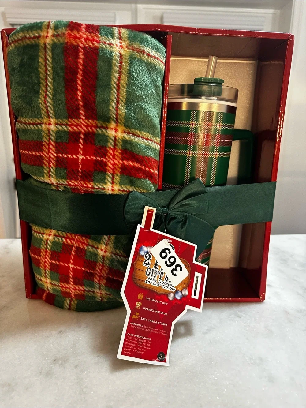 Festive Christmas plaid gift set. Featuring cozy blanket and Insulated Tumbler
